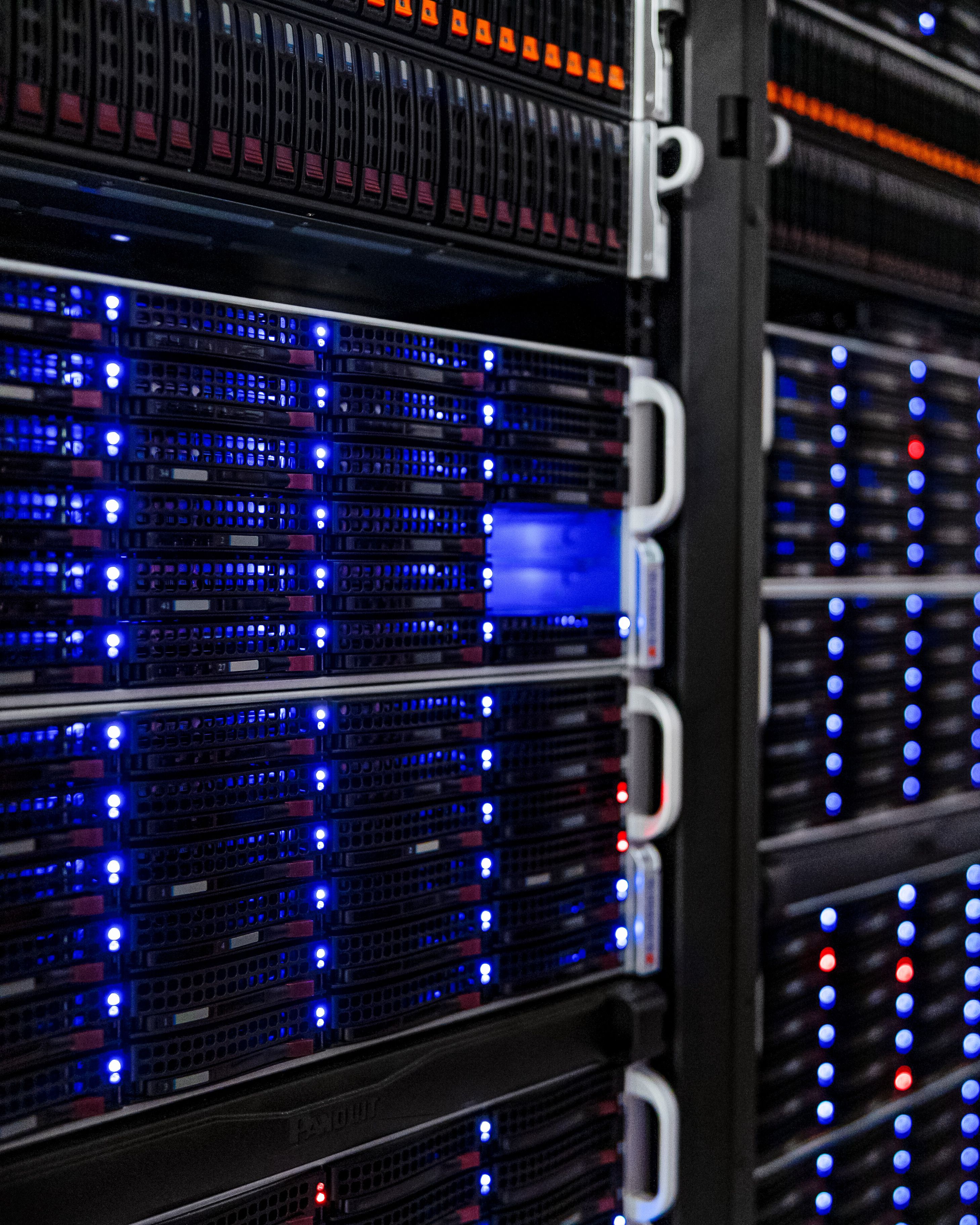 Server racks with rows of blue status lights