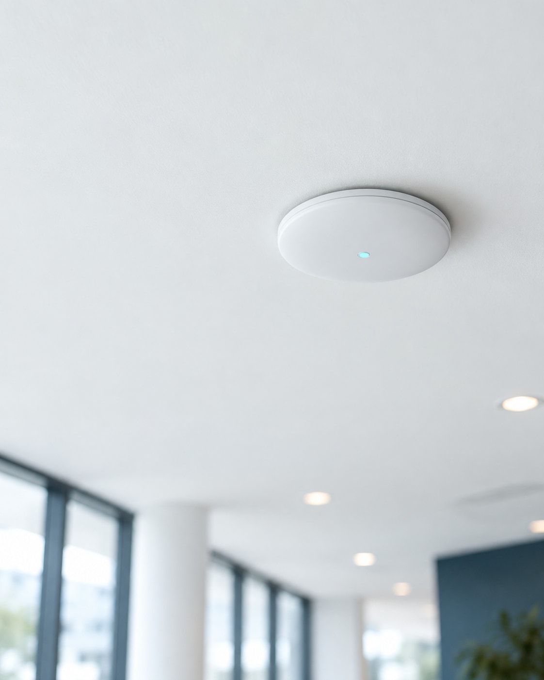 Wireless access point mounted on an office ceiling